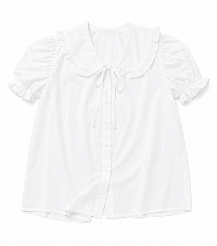 Camisa romántica de algodón orgánico con detalles de ribetes de seda