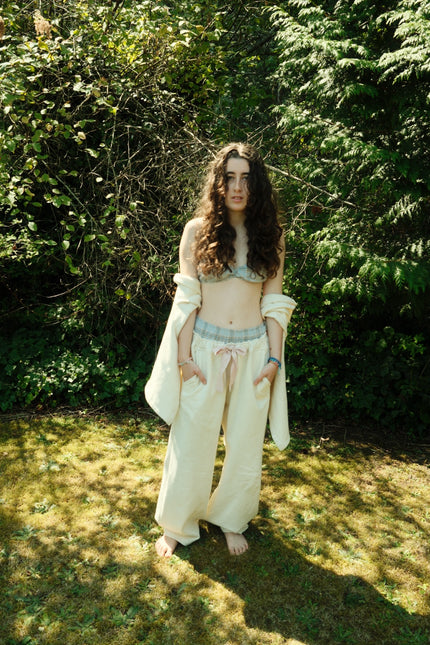 Full-length outdoor styling of butter yellow Field Fleece Pant